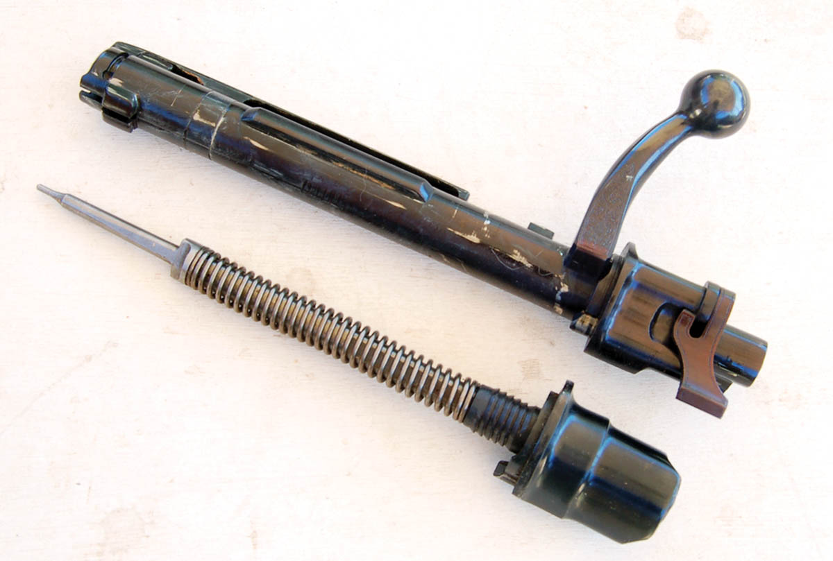 The modern bolt sleeve of the Mark X action  (bottom) was replaced by the military unit (top). It looks better.